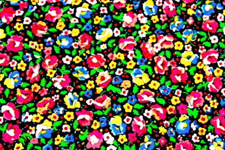 Design of Small Floral Abstract Pattern in Pinks, Blues and Yellows with Green Leavesの写真素材