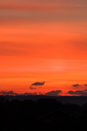 Red sky at dawn for use as background or for text or copy.の写真素材