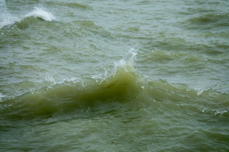 Wave breaking with water droplets