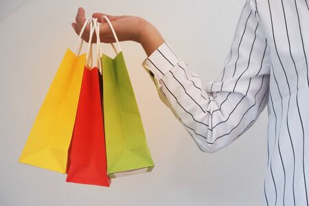 women holding shopping paper bags for shopping retailing concept.の写真素材