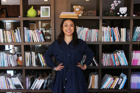 Asian woman in library