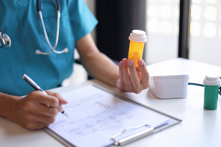 Doctor or authorized medical professional orders a specific medication for a patient to treat an illness or injury.の写真素材