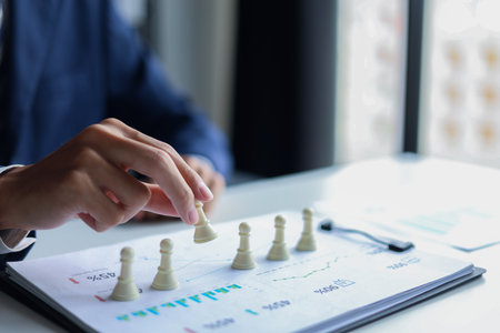 Businessman playing chess game. Business strategy, leadership, planning and management concept.の写真素材