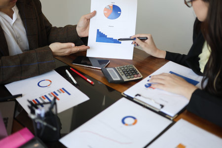 Business people meeting for brainstorming, discussing and analyzing data