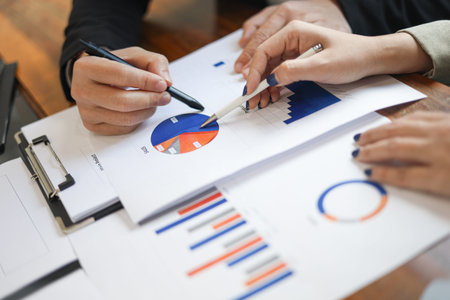 Business people meeting for brainstorming, discussing and analyzing data
