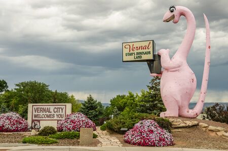 This delightful pink dinosaur offers a huge welcome to visitors to Vernal, Utah.  Be careful, she is likely to roll her eyes at you if you stare too long!のeditorial素材
