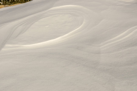 Soft and gentle patterns in the snow make a great background