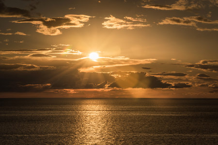 Sunrise at the coast in Praiola, Sicily, Italyの写真素材