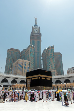 Mecca, Saudi Arabia - September 10, 2016: Muslim pilgrims put on their white ihrams circling around the holy Kaaba at daytime during Hajj in Saudi Arabiaのeditorial素材