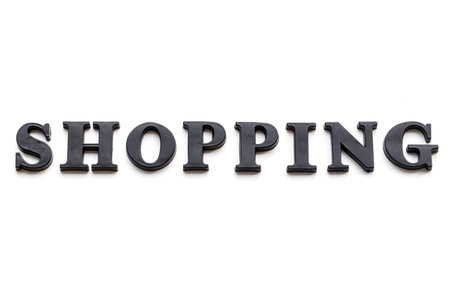 The inscription SHOPPING. SHOPPING in black bulk letters on a white background. Photo of the...