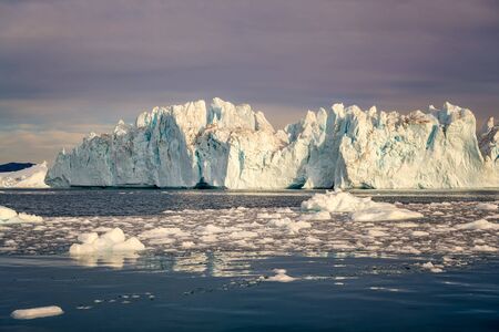 Greenland Ilulissat glaciers at ocean at polar nightの写真素材