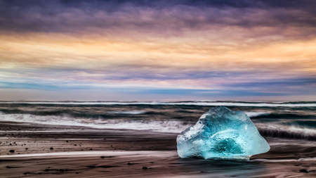 ice floes on the black sea sand and the coastの写真素材