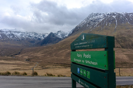 beautiful waterfalls Fairy Pools under the snowy mountains