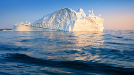 floating glaciers in the rays of the setting sun at polar night