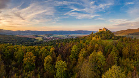 Krasna Horka castle from above in the background with the villageの写真素材