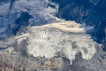 glacial stream flowing from glacier dArgentiere in the summerの写真素材