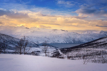 fjord and snowy mountain in Northern Norway
