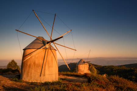 old windmills Penacova Moinhos de Gavinhos at sunsetの写真素材