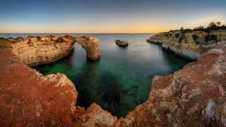Praia de Estaquinha with rocks and wavesの写真素材