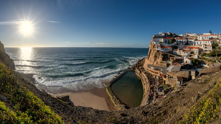 Azenhas do Mar, small town on the Portuguese coast at sunsetの写真素材