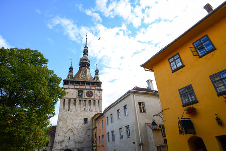 view of historical buildings in the Romanian city of Sighisoara in autumnの写真素材