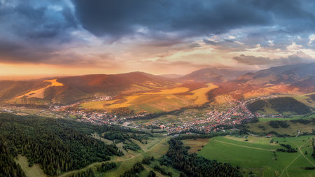 sunset over the village of Zuberec in the West Tatras in Slovakiaの写真素材