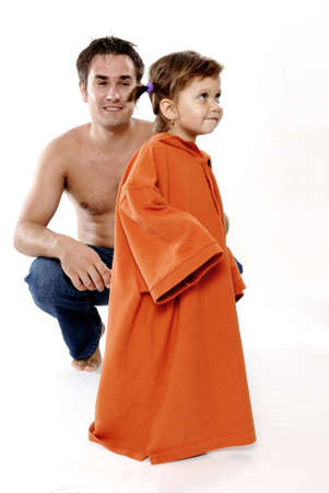 Picture of happy family - daughter stole father's shirtの写真素材