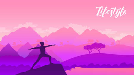Yoga exercise on the top of the mountains surrounded by natureの写真素材