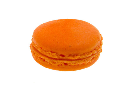 orange macaron isolated on white backgroundの写真素材