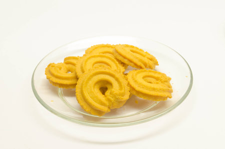 cookies on dish on white background.の写真素材