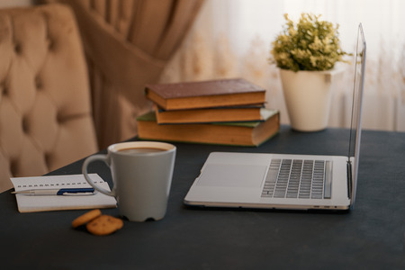 on work table, coffee and laptopの写真素材