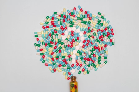 Pharmaceutical and health concept, Tablets float out from bottle into in question mark and capsules.の写真素材