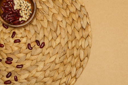 Flat lay of healthy grains concept, Red bean and soybean in wooden bowl on brown background.の写真素材
