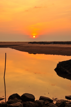sunset and stone at the beach Phangngaの写真素材