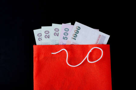 Pockets in red on a black backgroundの写真素材