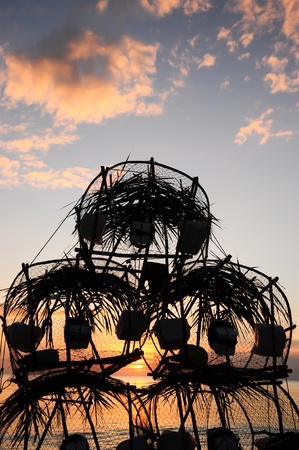 Trapping fish trap on the seashoreの写真素材