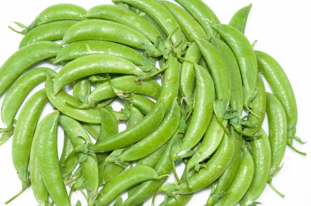 Fresh green peas on a white backgroundの写真素材