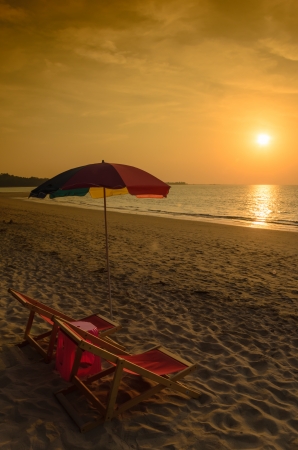 Beach chair umbrella in the evening の写真素材