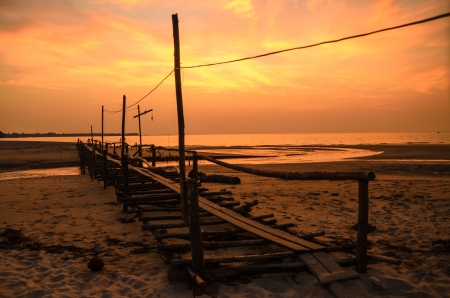Bridge to the beach in the evening の写真素材