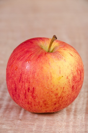 fresh apples on a wood backgroundの写真素材