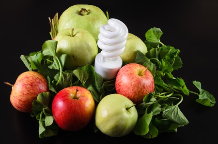 fresh fruit and vegetables on a black background の写真素材