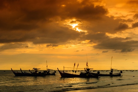 Fishing boat at the beachの写真素材