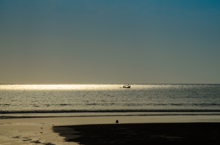Silhouette sunset at the beach and the skyの写真素材