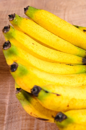 Banana on wood background の写真素材