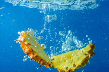 Pineapple overboard stating the actionの写真素材