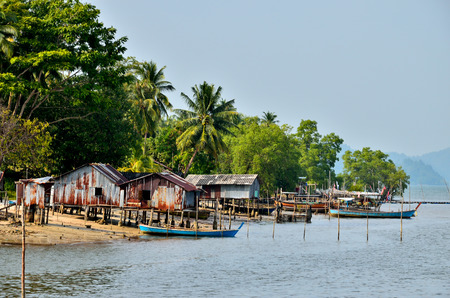 Boats and Village at Phra Thong Islandの写真素材