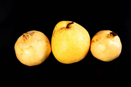 Fresh group oriental pear and pomegranate on black backgroundの写真素材
