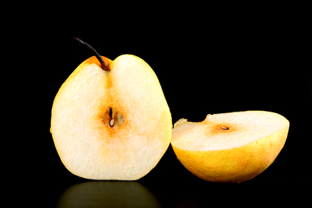 fresh nashi pear and  cut on black backgroundの写真素材