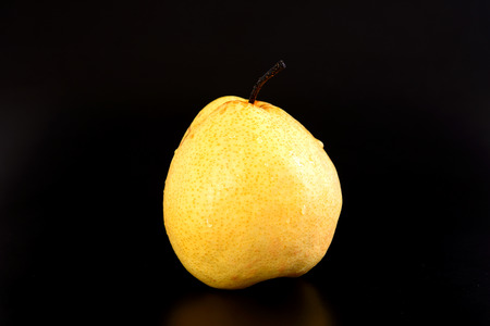 Fresh oriental pear on black backgroundの写真素材