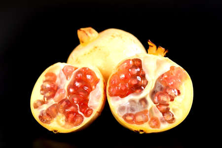 Pomegranate isolated on black backgroundの写真素材